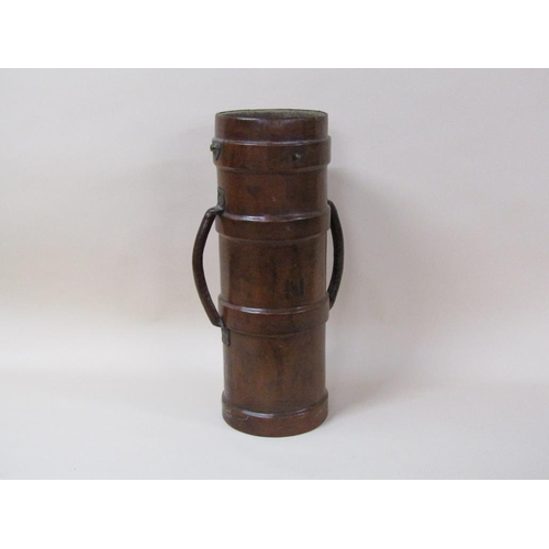 68 - A 19c brown leather canvas two handled powder/shot carrier of cylindrical form, 73cm h.