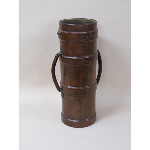 68 - A 19c brown leather canvas two handled powder/shot carrier of cylindrical form, 73cm h.