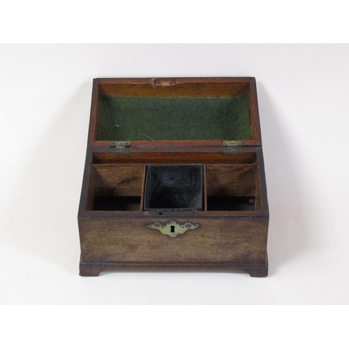 74 - A late Georgian mahogany three compartment tea caddy of sarcophagus form with hinged cover, central ... 