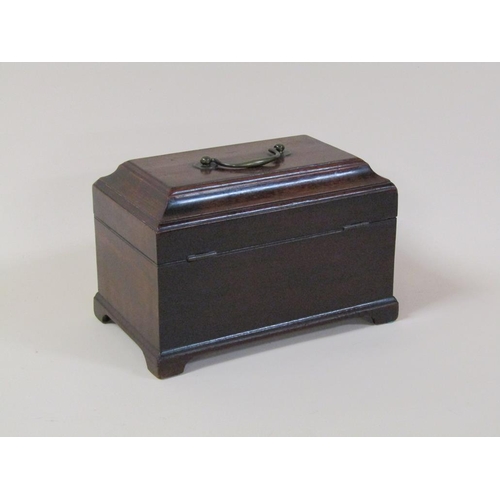 74 - A late Georgian mahogany three compartment tea caddy of sarcophagus form with hinged cover, central ... 