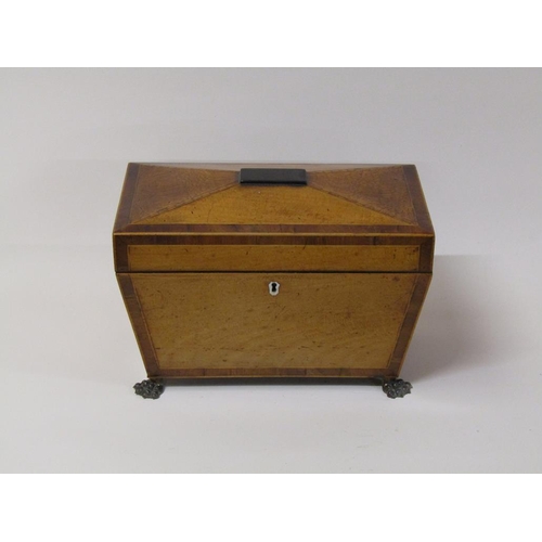 75 - A late Georgian satinwood two compartment tea caddy with mixing bowl and recess, being of sarcophagu... 