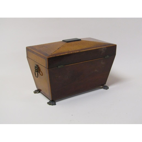 75 - A late Georgian satinwood two compartment tea caddy with mixing bowl and recess, being of sarcophagu... 