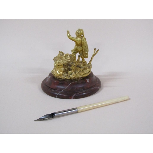 77 - A Victorian gilt bronze inkwell with the figure of a fisherman, the well with lift up cover and with... 