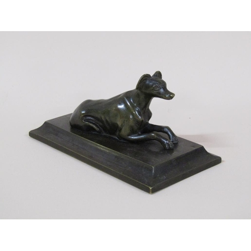 79 - An early 20c patinated bronze figure of a recumbent greyhound on a rectangular stepped base, 13cm w,... 