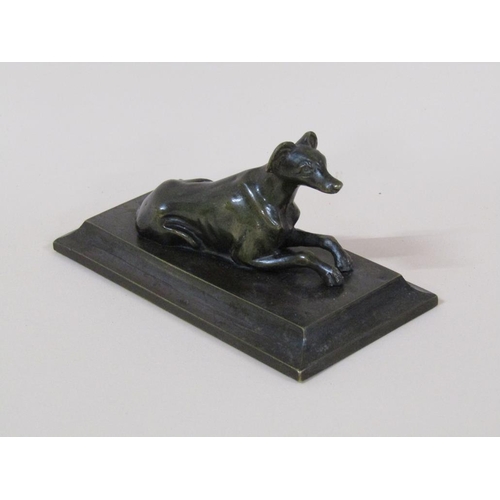 79 - An early 20c patinated bronze figure of a recumbent greyhound on a rectangular stepped base, 13cm w,... 