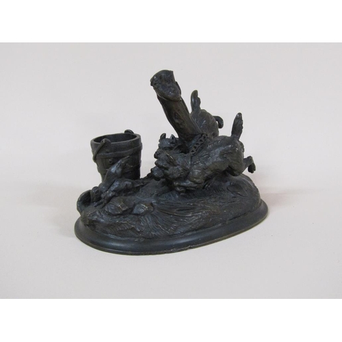 80 - A Victorian cast bronze figure group of two chained terriers chasing rats, the a vesta bucket, signe... 