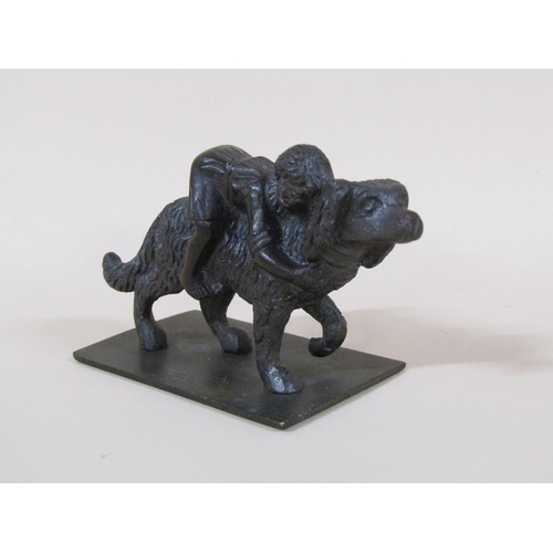 85 - A Victorian bronze figure group of a girl having a ride on a large dog, 7cm w.