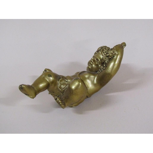 87 - A late Georgian gilt bronze figure of a cherub, 9cm h.