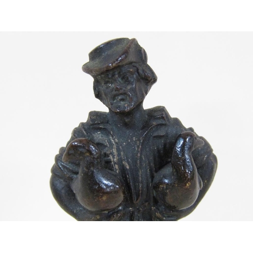 88 - A Victorian bronze figurative desk seal in the form of a Medieval gentleman carrying two ducks, 9cm ... 