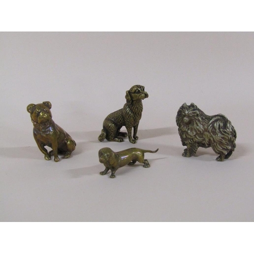 90 - An early 20c collection of four miniature dogs, three bronze and one nickel, 5cm to 6cm w.