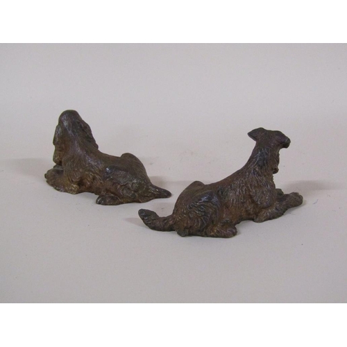 93 - A pair of Austrian patinated bronze miniature dogs, a terrier and a spaniel, each 7cm l.