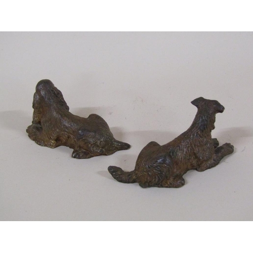 93 - A pair of Austrian patinated bronze miniature dogs, a terrier and a spaniel, each 7cm l.