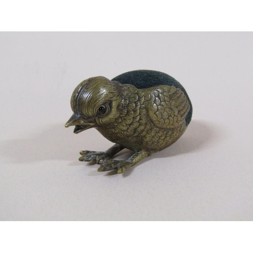 94 - An Edwardian brass chick pin cushion, 5cm w.