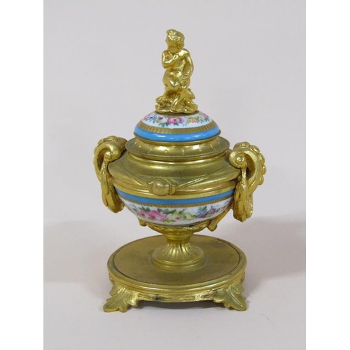 97 - A late 19c/early 20c ormolu ink stand with porcelain mounts, the hinge cover with a cherub finial, 1... 