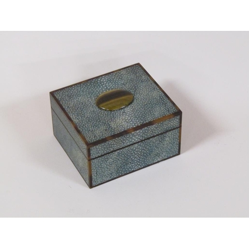 99 - An early 20c shagreen and tortoiseshell cigarette box with an agate stone mount, 12cm w, 6.5cm h.