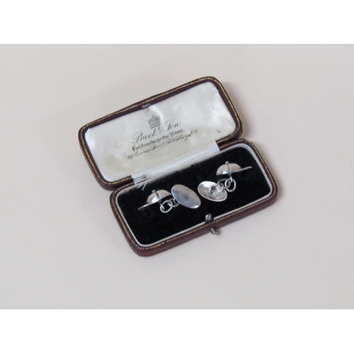 115 - A pair of sterling silver (stamped 925) jockey cap cufflinks.