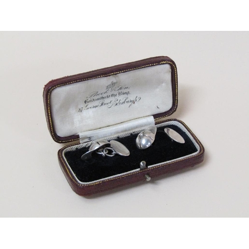 115 - A pair of sterling silver (stamped 925) jockey cap cufflinks.