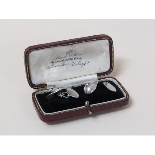 115 - A pair of sterling silver (stamped 925) jockey cap cufflinks.