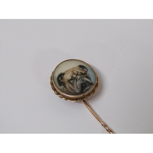 117 - A 9ct gold enamel bulldog stick pin.