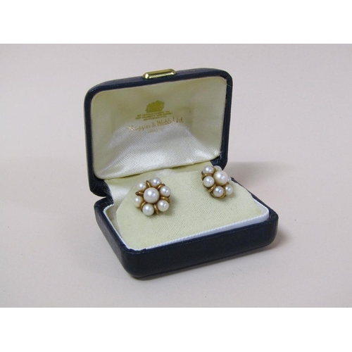 119 - A pair of 9ct gold pearl daisy earrings.