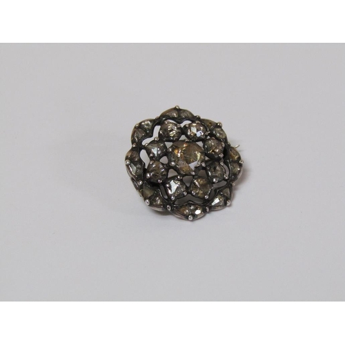 122 - A Victorian diamond brooch of floral form set with twenty five old cut graduated stones.