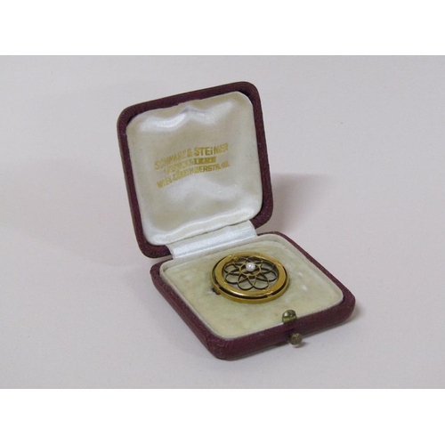 126 - A 14ct gold circular seed pearl set brooch in a Schwarz & Steiner fitted red leather box, 2.3g.