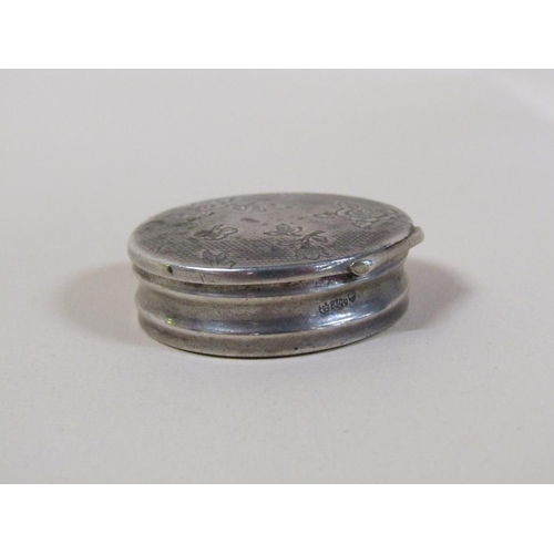 129 - A late 19c Continental silver pill box of circular form with an engine turned floral incised hinged ... 