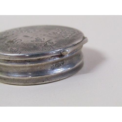 129 - A late 19c Continental silver pill box of circular form with an engine turned floral incised hinged ... 