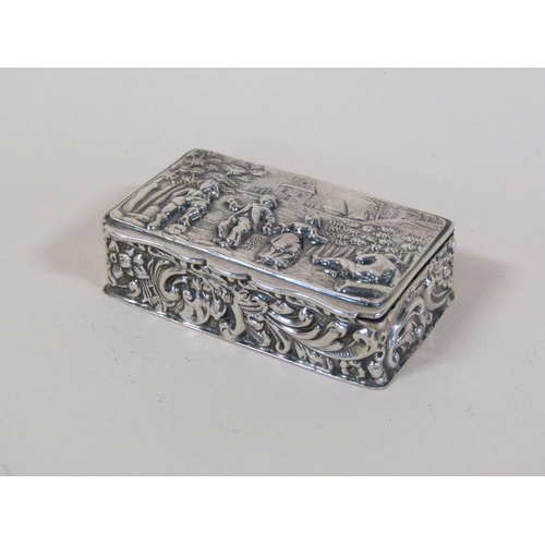 132 - A late Victorian silver table snuff box with hinge cover, embossed and chased throughout with figure... 