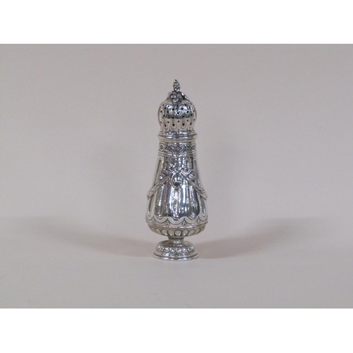 140 - A 19c French silver sugar caster with a pierced dome cover, fruit finial and swags to the baluster b... 