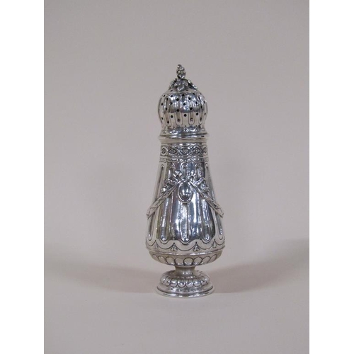 140 - A 19c French silver sugar caster with a pierced dome cover, fruit finial and swags to the baluster b... 