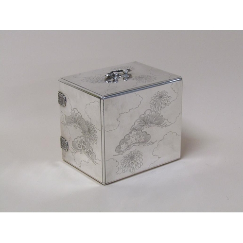 142 - A Japanese silver jewel box of Meiji period with three ebonised drawers and interior panelled doors,... 