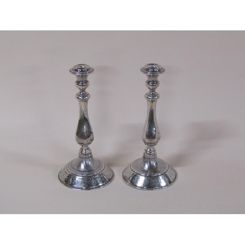 143 - A pair of late 19c Continental silver candlesticks, 16.5ozt, 31cm h.