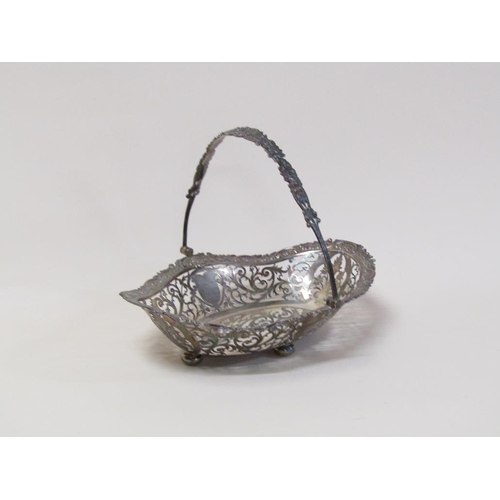 147 - An early 20c, 19c style, silver fruit basket of quatrefoil form with pierced raised border and cast ... 