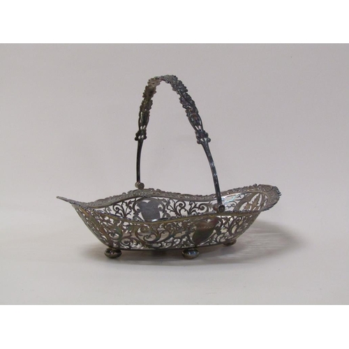 147 - An early 20c, 19c style, silver fruit basket of quatrefoil form with pierced raised border and cast ... 