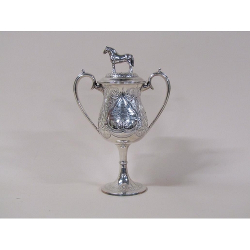 149 - A late Victorian two handled silver trophy cup, awarded for the best foal in show 1889, with lift of... 