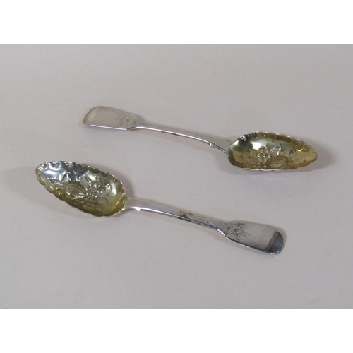 157 - A pair of late Georgian silver berry spoons with gilt embossed bowls, London 1826, 4.8ozt.