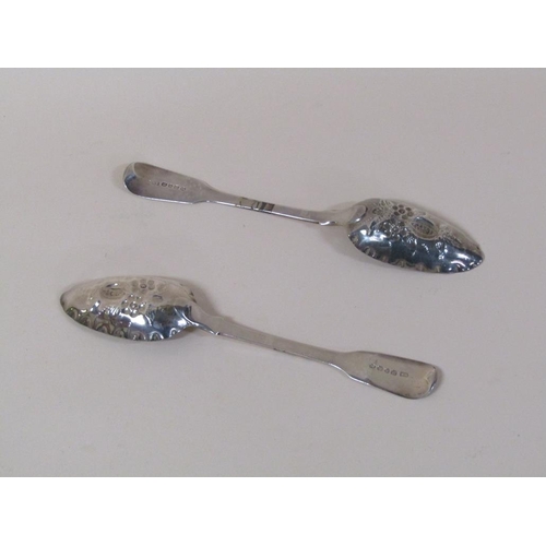 157 - A pair of late Georgian silver berry spoons with gilt embossed bowls, London 1826, 4.8ozt.