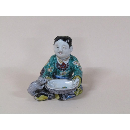 174 - An Oriental polychrome figure of a boy with bowl feeding a dog, a/f to dogs tail, 13cm h.