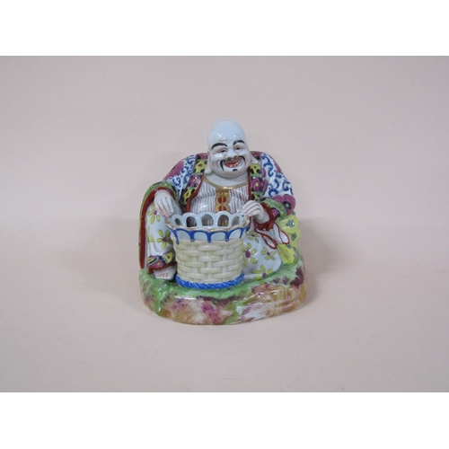 175 - A 19c Chinese porcelain figurative incense burner in the form of Hotei, 17cm h.