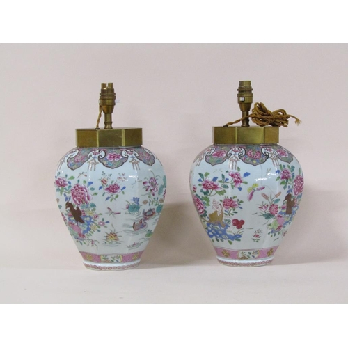 176 - A pair famille rose style porcelain lamps converted from jars, decorated with birds, flowers, insect... 