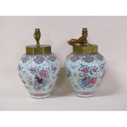 176 - A pair famille rose style porcelain lamps converted from jars, decorated with birds, flowers, insect... 