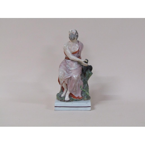 178 - An early 19c Staffordshire figure - Elijah and the raven, 26cm h.