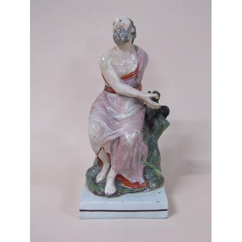 178 - An early 19c Staffordshire figure - Elijah and the raven, 26cm h.