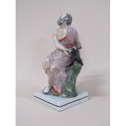 178 - An early 19c Staffordshire figure - Elijah and the raven, 26cm h.