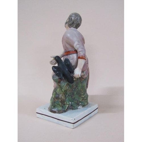 178 - An early 19c Staffordshire figure - Elijah and the raven, 26cm h.