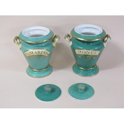 184 - A pair of 19c Samuel Alcock & Co Cobridge Staffordshire earthenware pharmacy jars and covers, two ha... 