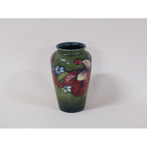 192 - A mid 20c Moorcroft Orchid vase of slight baluster form, decorated on a green ground, painted and im... 