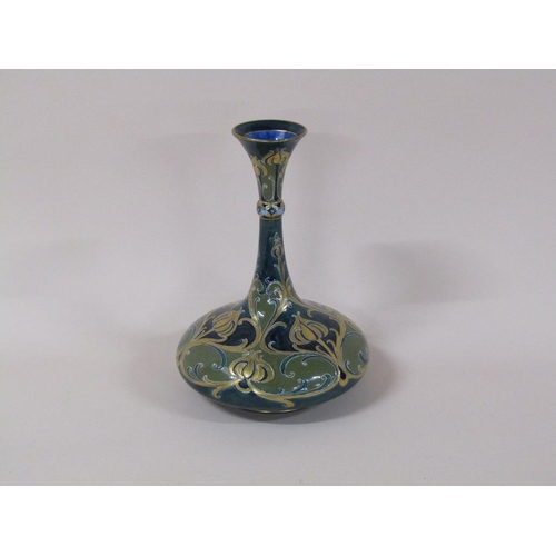 195 - A Macintyre Moorcroft Florian vase of baluster form with slender tapering neck, with stylised poppy ... 