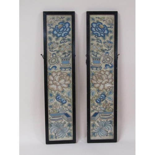 202 - A pair of late 19c/early 20c Oriental silk work panels of leaf and flowers, framed and glazed, 49cm ... 